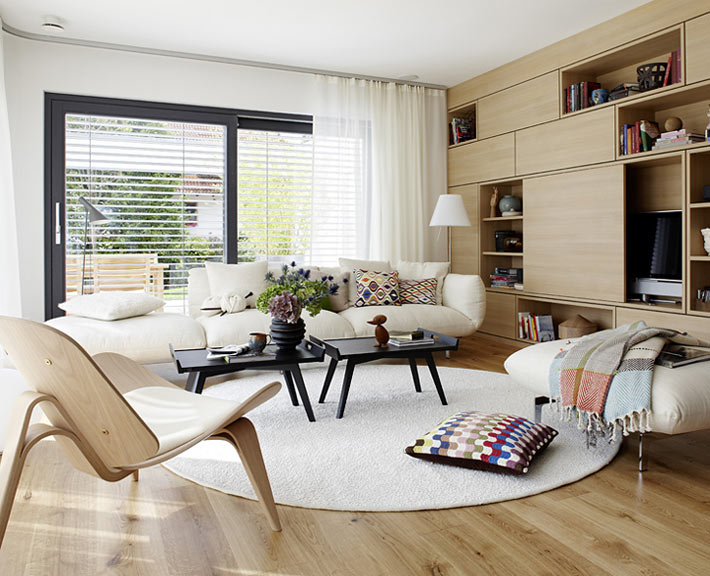 Varför du ska välja ett cirkulärt arrangemang av möbler i vardagsrummet