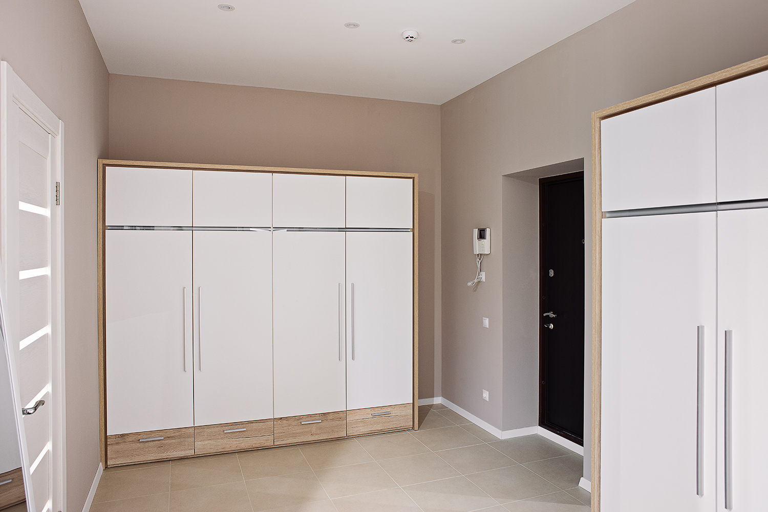 White wardrobe in the design of the apartment