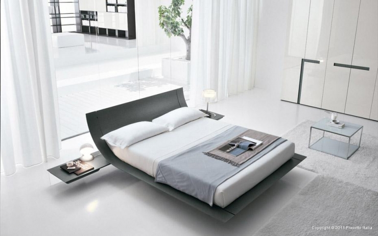 Moderna pelēka gulta